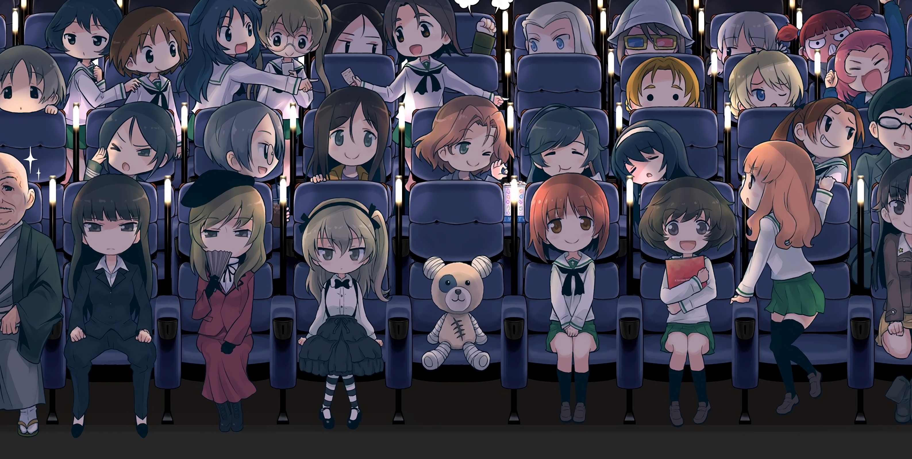 A picture of the Girls und Panzer characters sitting in a theatre, facing the viewer.